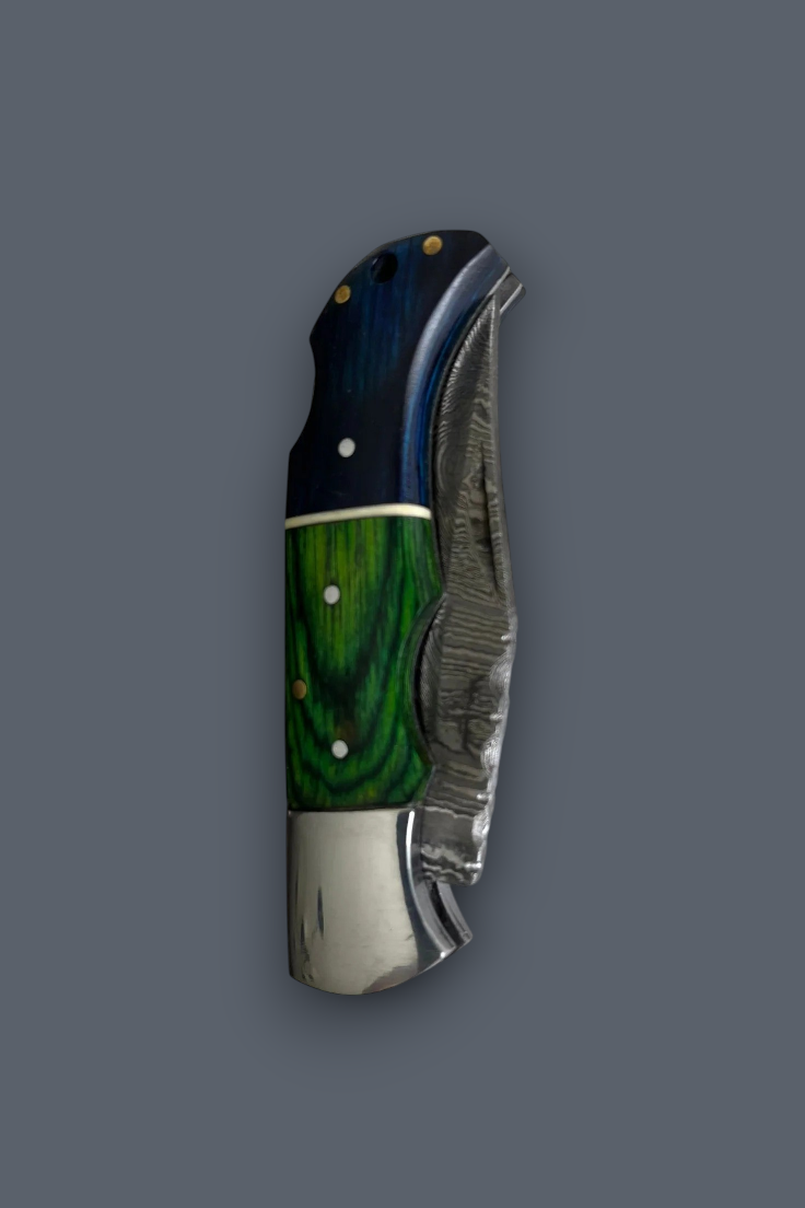 A folding pocket knife with a dark blue and green marbled wood handle, set against a solid dark gray background.