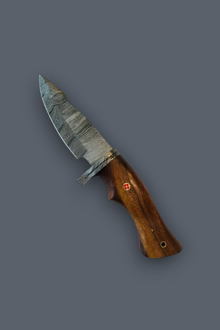A fixed-blade knife with a patterned steel blade and a polished brown wooden handle, shown diagonally against a solid dark gray background.