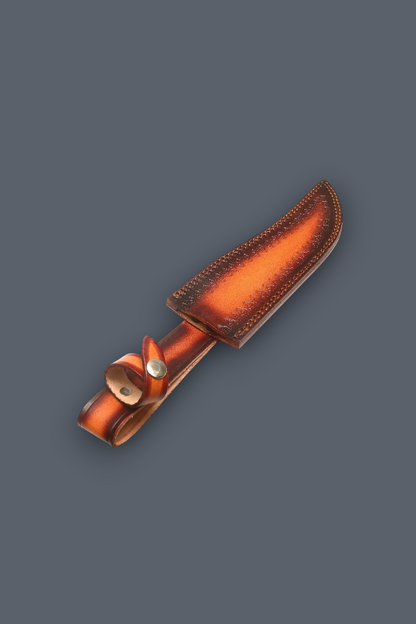 A small knife with a brown leather sheath, displayed diagonally on a solid dark gray background.
