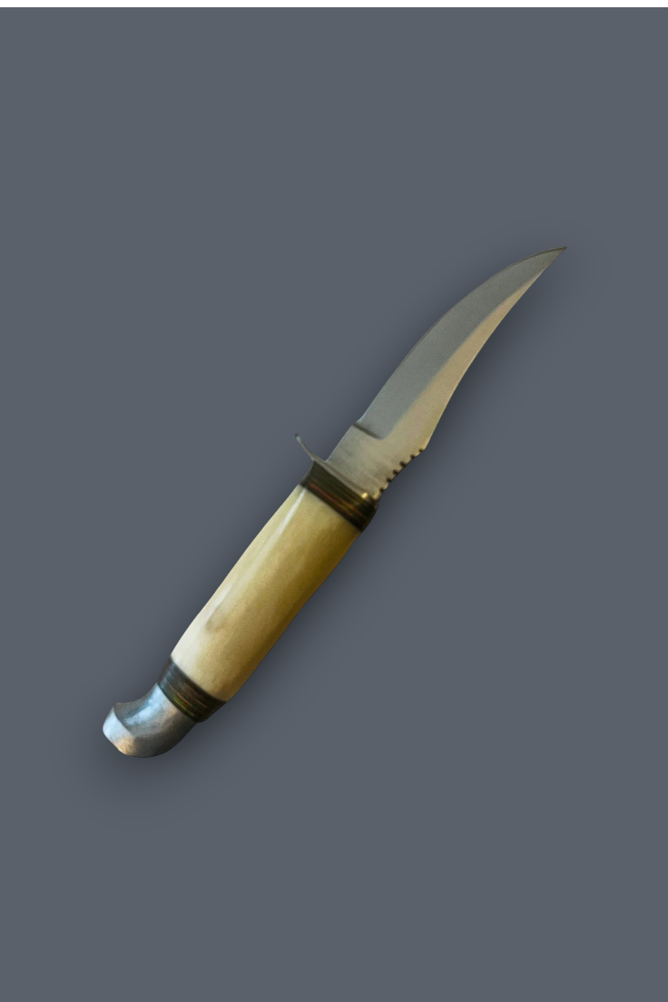 A curved fixed-blade knife with a light beige bone or horn handle, dark metal collar bands, and a silver steel blade, shown against a solid dark gray background.