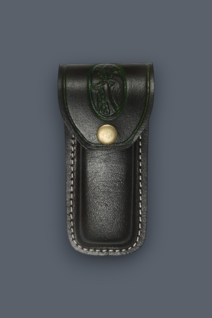 A dark brown leather Sheath with a snap button closure and an embossed eagle emblem on the flap, shown against a solid dark gray background.
