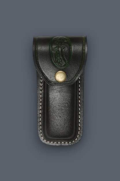 A dark brown leather Sheath with a snap button closure and an embossed eagle emblem on the flap, shown against a solid dark gray background.