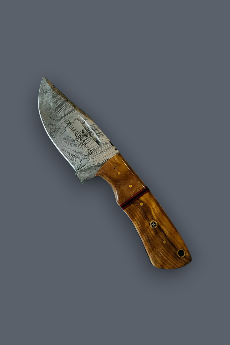 A custom fixed-blade knife with a patterned Damascus-style steel blade and a polished brown wood handle, shown diagonally on a solid dark gray background.