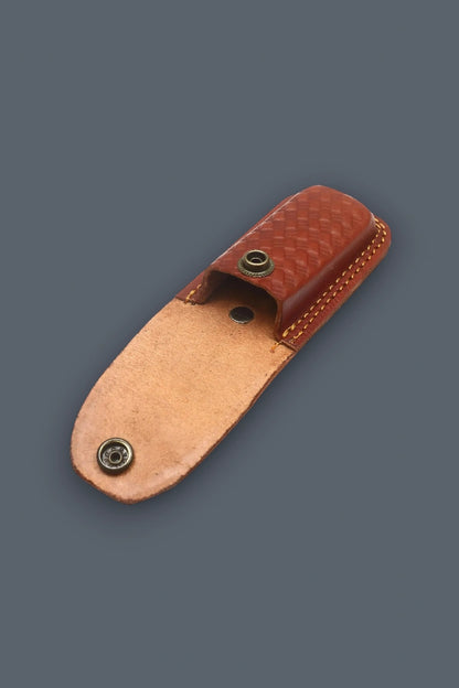 Open brown leather sheath featuring a basketweave pattern and snap closure for the Pioneer Pocket folding knife.