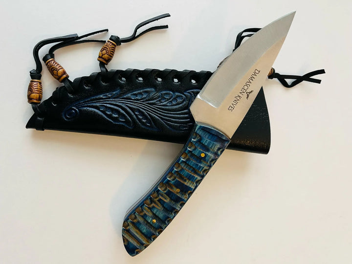 Blue Phantom Fixed Blade Hunting Knife with handcrafted leather sheath – full-tang stainless steel design.