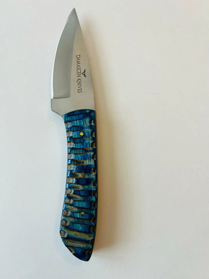 Full-tang Blue Phantom Fixed Blade Knife side view highlighting balance, strength, and sleek design.