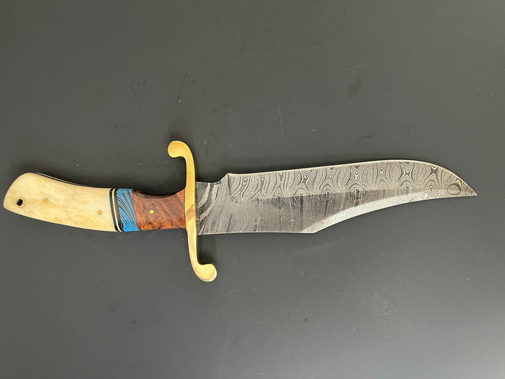 Top-down view of Bowie Hunting Knife with brass guard and bone handle