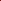 Two kitchen knives with patterned steel blades and dark wood handles, arranged vertically on a solid red background.