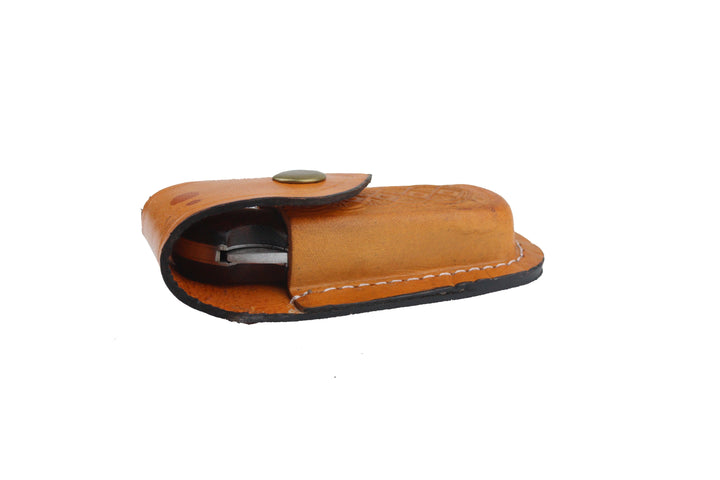 Side view of genuine leather sheath with button closure for Damascus folding knife.
