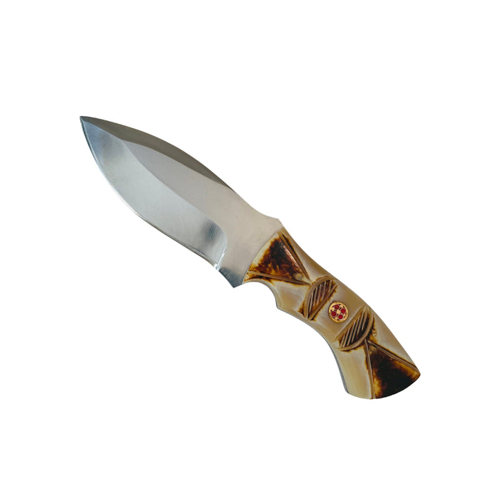 Angled view of 4-inch Damascus fixed blade hunting knife highlighting wave pattern and steel shine.