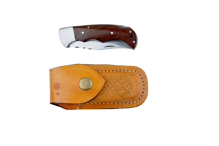 Closed Damascus folding pocket knife with polished wooden handle and stainless-steel bolster.