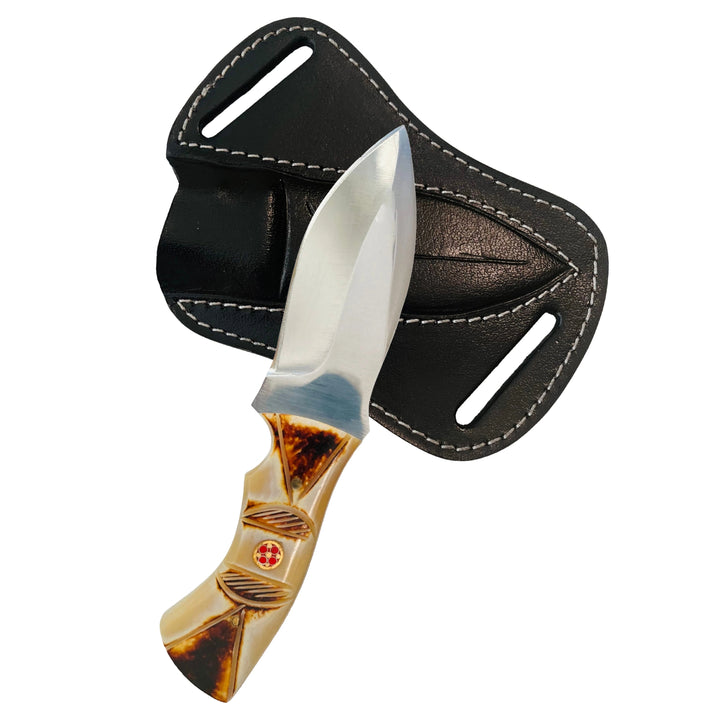 Flat lay of 4-inch Damascus hunting knife with black leather sheath handcrafted by Damascen Knives.