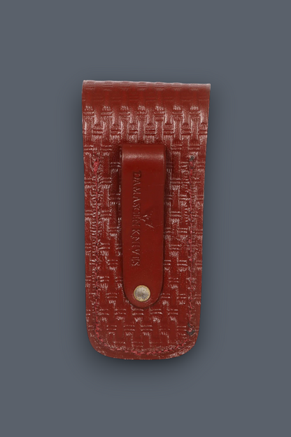 Back of cowhide folding knife sheath showing belt carry design
