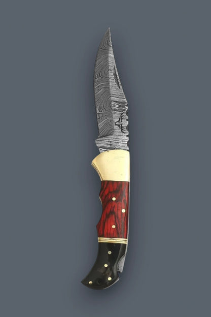 Vertical profile of the fully open Pioneer Pocket Damascus folding knife featuring a brass bolster and multicolor wood handle.