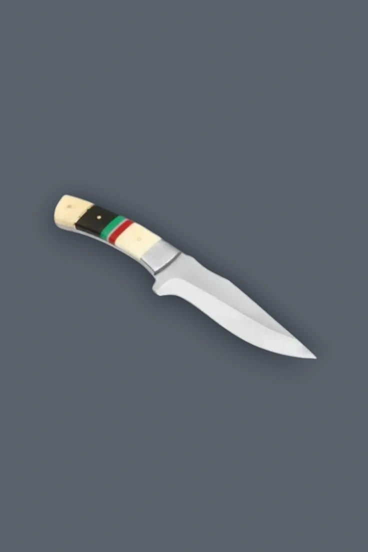 Downward diagonal flat lay of the stainless steel fixed blade hunting knife, highlighting the full tang construction and the ergonomic curve of the banded bone handle.
