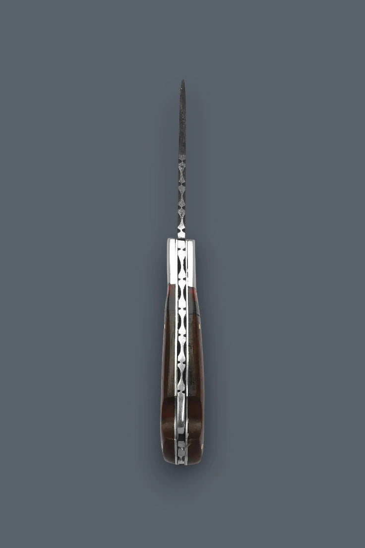 Vertical edge-on profile of the fully open The Gentry Knife highlighting the symmetrical wood handle construction and intricate spine filework.