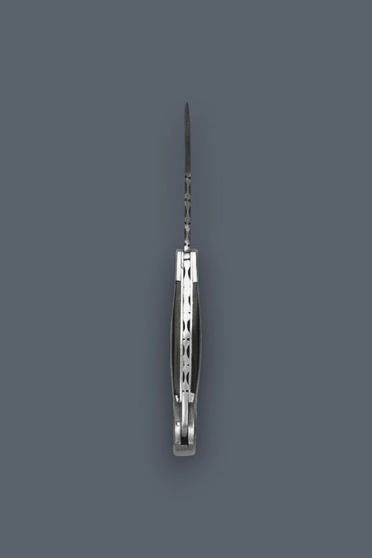 Vertical edge-on profile of the fully open The Squire Damascus folding knife showcasing the intricate spine filework and symmetrical handle assembly.